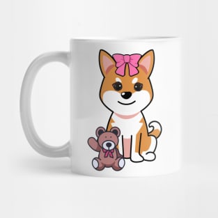 Funny orange dog is holding a teddy bear Mug